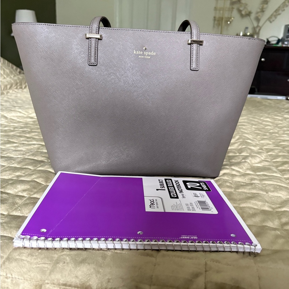 Kate Spade Cedar Street Medium Harmony Tote bag in a pebble (tan/taupe) color.